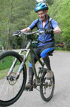 riding a smaller mountain bike